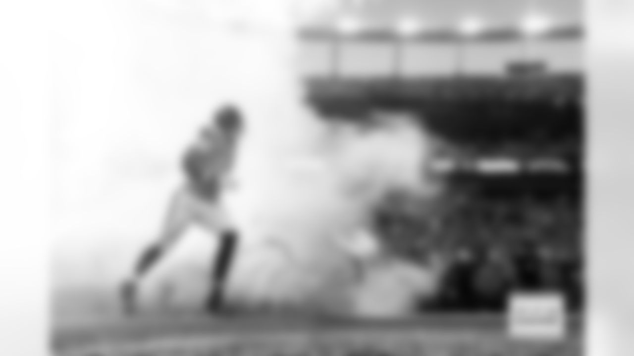 runs out of the tunnel for player introductions before the Broncos' Week 15 game against the Green Bay Packers at Empower Field at Mile High in Denver, Colorado on December 14, 2025. Photo by Gabriel Christus / Denver Broncos