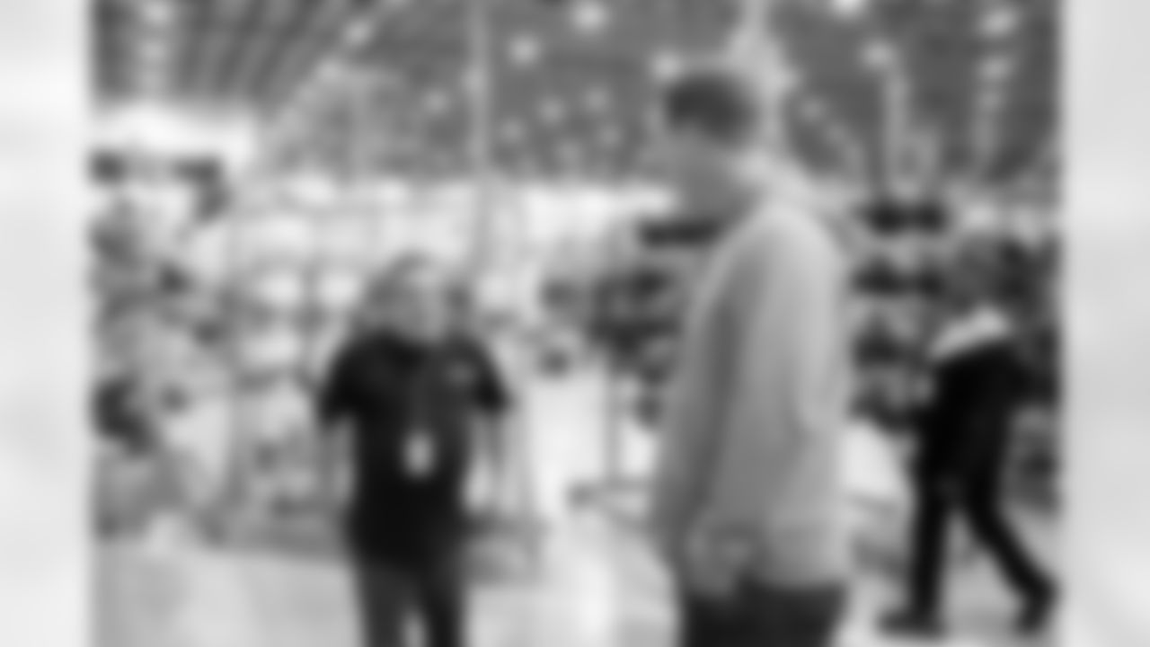 Peyton Manning talks with a Riddell employee during a tour to see the All In. All. Covered Riddell helmets being made on Wednesday, April 16, 2025 at Riddell Factory in North Ridgeville, Ohio.
Photo by Gabriel Christus / Denver Broncos