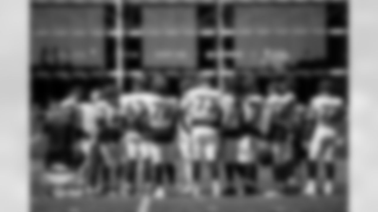 The offensive line huddles together during practice at Broncos Park Powered by CommonSpirit on August 19, 2025 in Englewood, Colorado. Photo by Ben Swanson / Denver Broncos