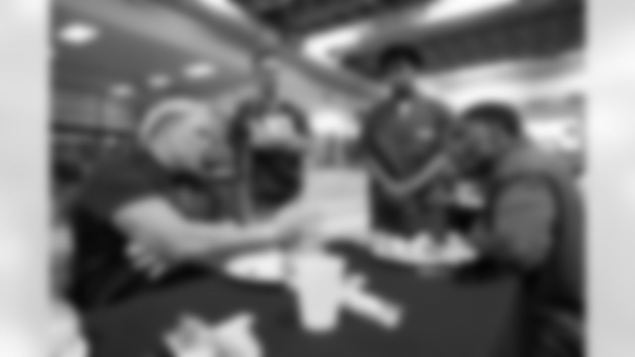 Garett Bolles talks with inmates during a visit to the Arkansas Valley Correctional Facility in Ordway, Colorado on October 14, 2025. In partnership with the Vera Institute of Justice, the Denver Broncos Foundation toured ChangeMakers Village (a Restoring Promise Unit).Photo by Gabriel Christus / Denver Broncos