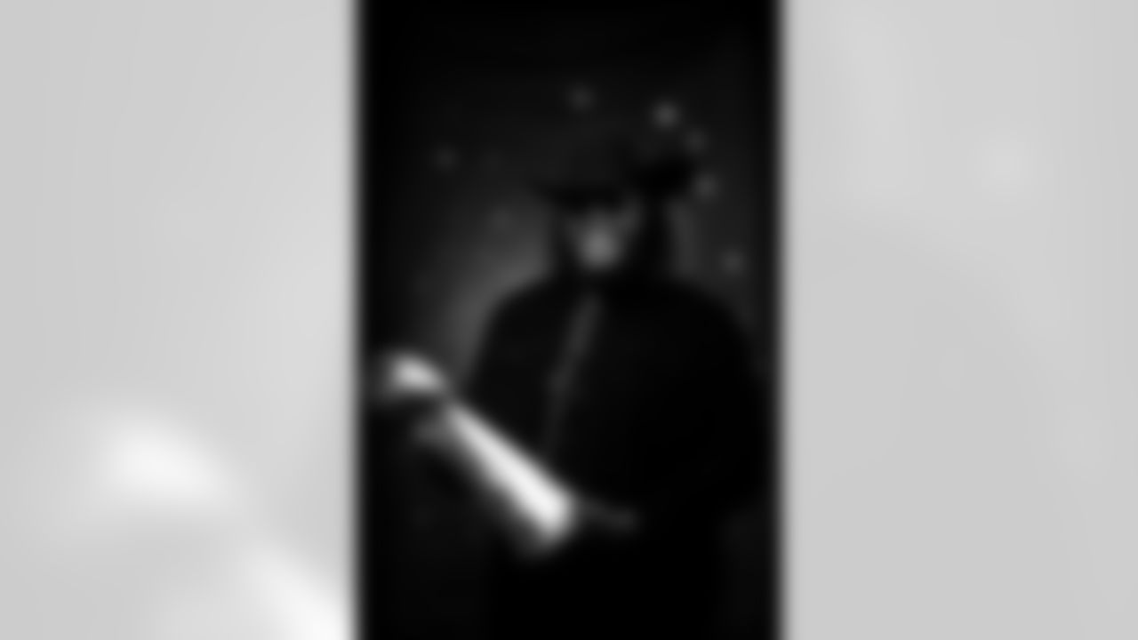 Max Garcia poses for a portrait at the 2025 Alumni Weekend Reception on October 18, 2025. Photo by Ben Swanson / Denver Broncos