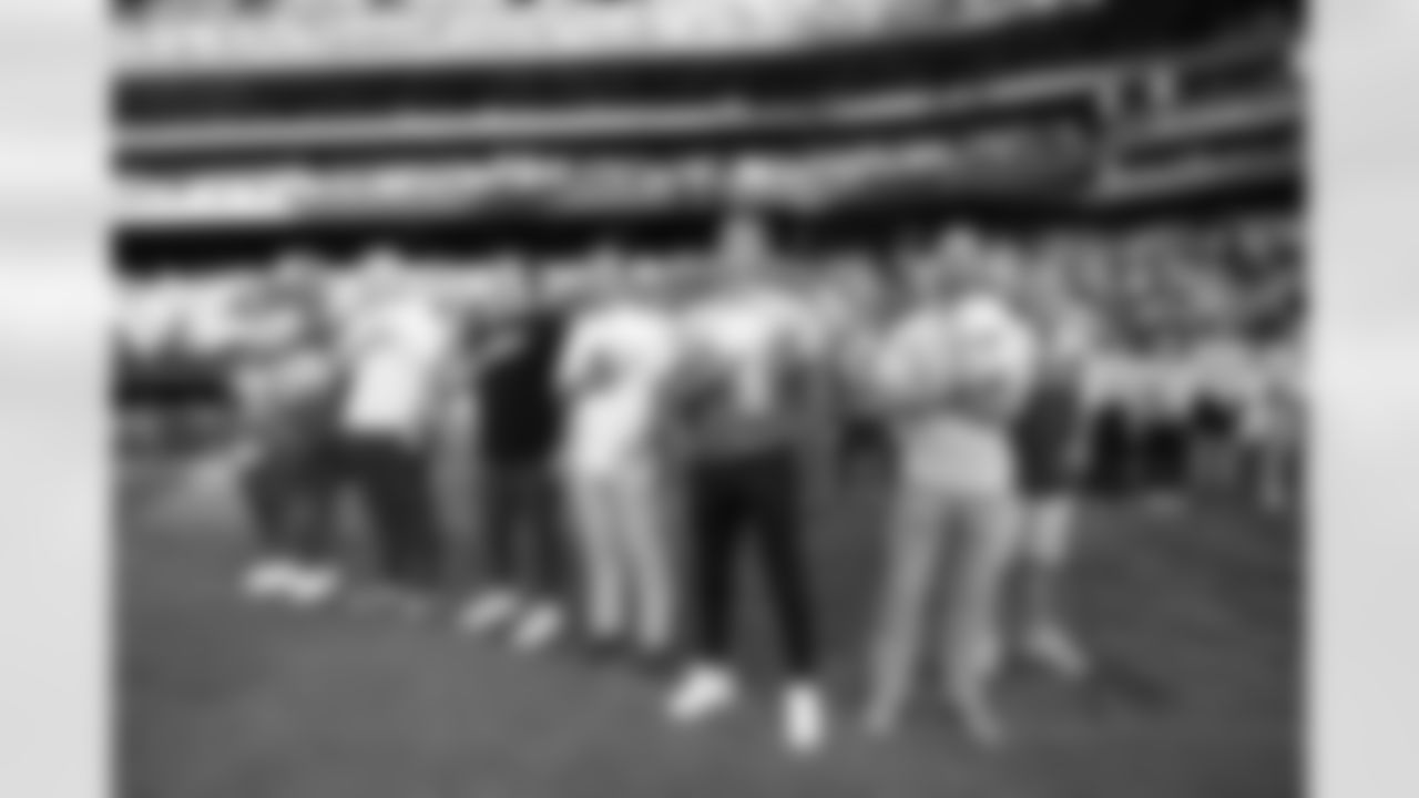 Dinger, Frank Crum, Nick Gargiulo, Sam Ehlinger, Bo Nix and Wil Lutz during the national anthem before the Colorado Rockies game against the New York Yankees on Friday, May 23, 2025 at Coors Field in Denver, Colorado.
Photo by Gabriel Christus / Denver Broncos