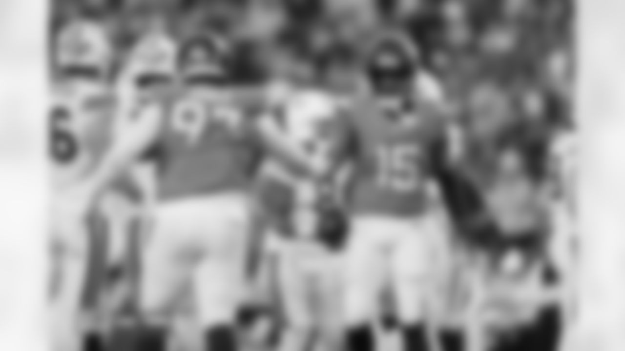 D.J. Jones and Nik Bonitto (15) during the Broncos' Week 15 game against the Green Bay Packers at Empower Field at Mile High in Denver, Colorado on December 14, 2025. Photo by Gabriel Christus / Denver Broncos