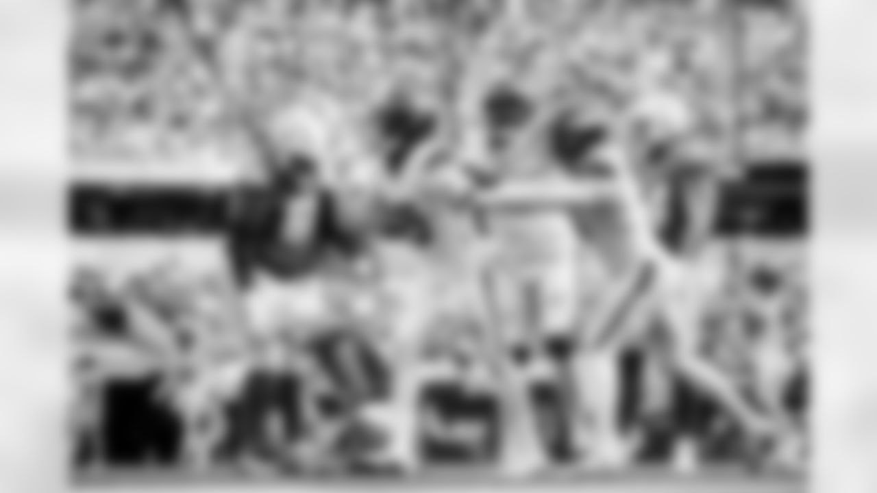 Denver Broncos linebacker Nik Bonitto (15) celebrates with defensive end Eyioma Uwazurike (96) and linebacker Jonathon Cooper (0) after a sack during the Broncos' Week 3 game against the Los Angeles Chargers at SoFi Stadium in Inglewood, California on September 21, 2025. Photo by Ben Swanson / Denver Broncos