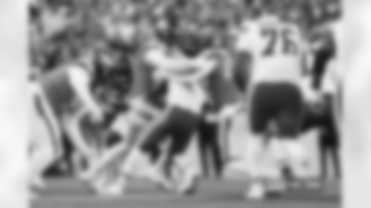 Jonathon Cooper and Justin Strnad during the Broncos' Week 11 game against the Kansas City Chiefs at Empower Field at Mile High in Denver, Colorado on November 16, 2025. Photo by Ben Swanson / Denver Broncos