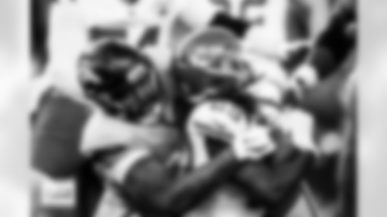 Denver Broncos defensive end Eyioma Uwazurike (96) tackles Kansas City Chiefs running back Kareem Hunt (29) during the Broncos' Week 11 game against the Kansas City Chiefs at Empower Field at Mile High in Denver, Colorado on November 16, 2025. Photo by Ben Swanson / Denver Broncos