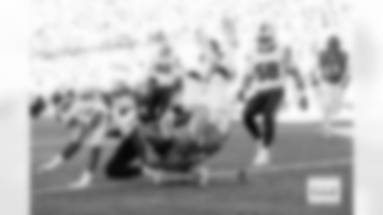 Denver Broncos offensive tackle Frank Crum (73) runs with the ball after a reception into the end zone for a touchdown during the Broncos' Divisional Round playoff game against the Buffalo Bills at Empower Field at Mile High in Denver, Colorado on January 17, 2026. Photo by Gabriel Christus / Denver Broncos