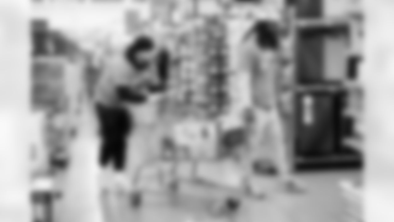 Children from the Denver Broncos Boys & Girls Club participate in a Shop with a Jock shopping spree with Broncos players, alumni and cheerleader alumni in Aurora, Colorado on December 2, 2025. Photo by Ben Swanson / Denver Broncos