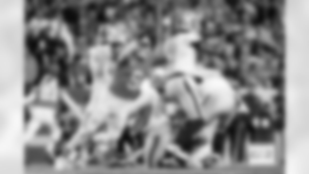 Denver Broncos safety Talanoa Hufanga (9) tackles Las Vegas Raiders quarterback Geno Smith (7) during the Broncos' Week 10 game against the Las Vegas Raiders at Empower Field at Mile High in Denver, Colorado on November 6, 2025. Photo by Gabriel Christus / Denver Broncos