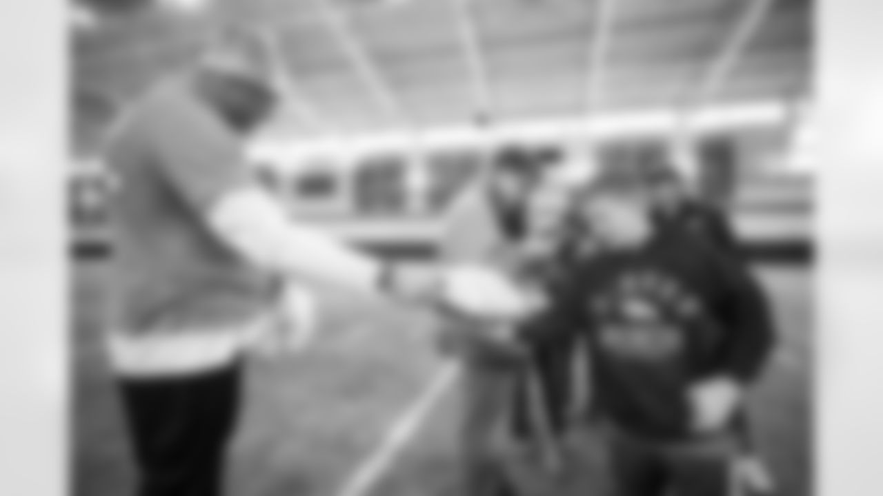 Garett Bolles during a Make-A-Wish visit from Logan at Centura Health Training Center in Englewood, Colorado on October 28, 2023. Photo by Ben Swanson / Denver Broncos