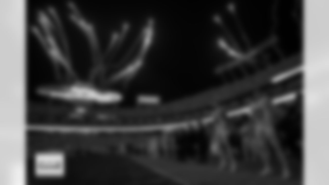 Fireworks go off behind wide receiver Courtland Sutton (14) and quarterback Bo Nix (10) before the Broncos' Week 17 game against the Kansas City Chiefs at GEHA Field at Arrowhead Stadium in Kansas City, Missouri on December 25, 2025. Photo by Ben Swanson / Denver Broncos