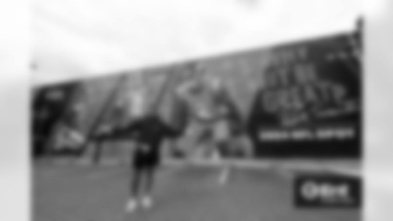 Pat Surtain II visits the mural painted in recognition of his 2024 Defensive Player of the Year award in downtown Denver , Colorado on May 27, 2025. Photo by Gabriel Christus / Denver Broncos