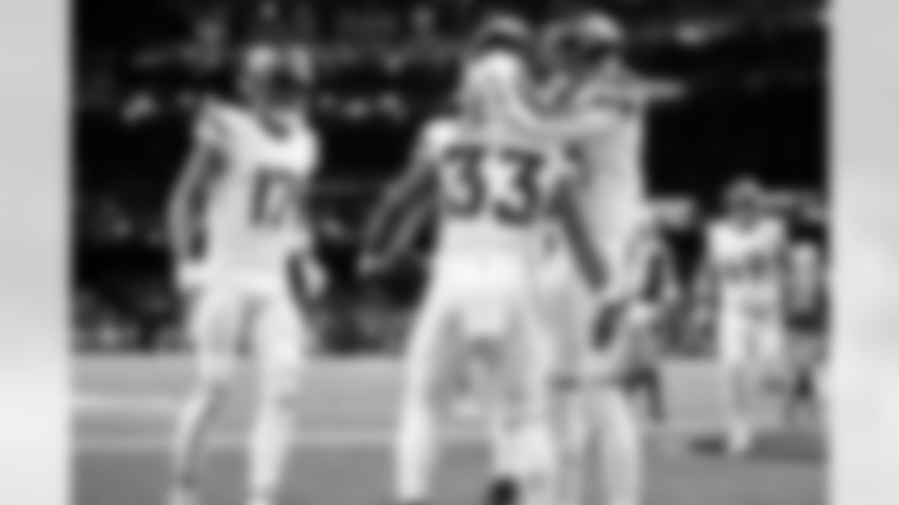 Javonte Williams celebrates with Courtland Sutton after a touchdown run during the Broncos' Week 7 game against the New Orleans Saints at Caesars Superdome in New Orleans, Louisiana on October 17, 2024. Photo by Gabriel Christus / Denver Broncos
