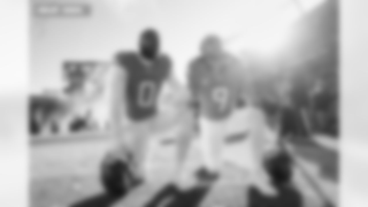 Jonathon Cooper (0) and Talanoa Hufanga (9) during the Broncos' Divisional Round playoff game against the Buffalo Bills at Empower Field at Mile High in Denver, Colorado on January 17, 2026. Photo by Ben Swanson / Denver Broncos