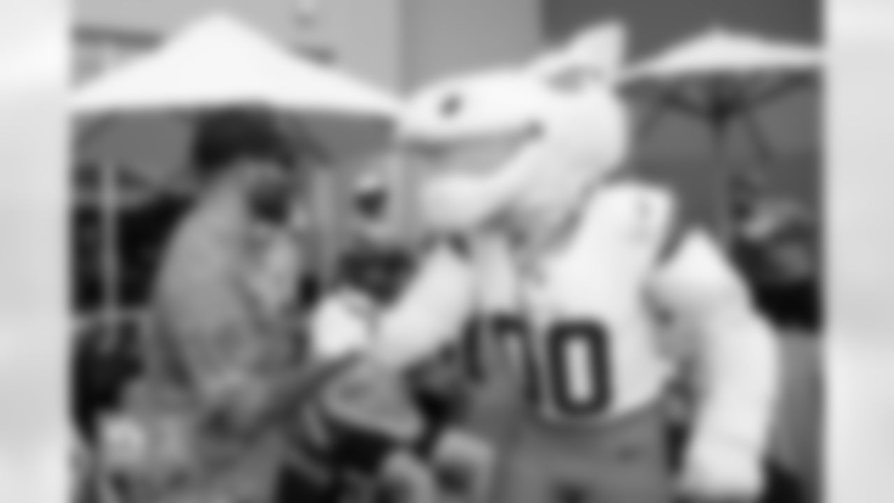 Miles the Mascot meets military members during a visit to practice in partnership with USAA at Broncos Park Powered by CommonSpirit in Englewood, Colorado on August 21, 2024. Photo by Ben Swanson / Denver Broncos