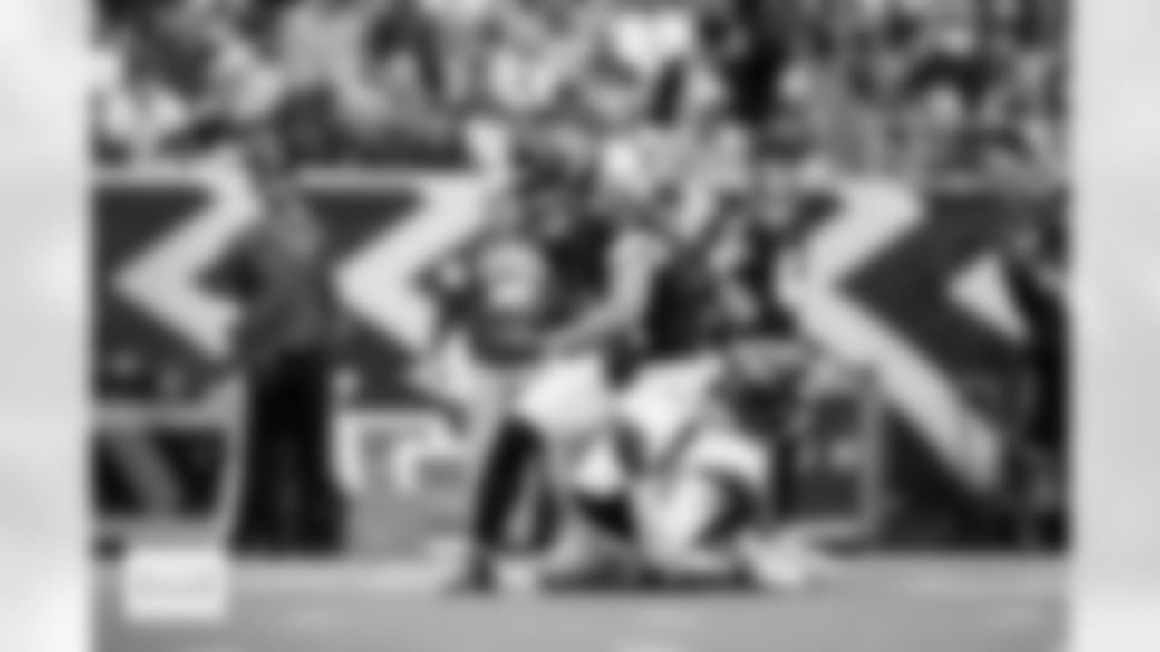 Denver Broncos safety JL Skinner (34) tackles Houston Texans wide receiver Jared Wayne (14) during the Broncos' Week 9 game against the Houston Texans at NRG Stadium in Houston, Texas on November 2, 2025. Photo by Gabriel Christus / Denver Broncos