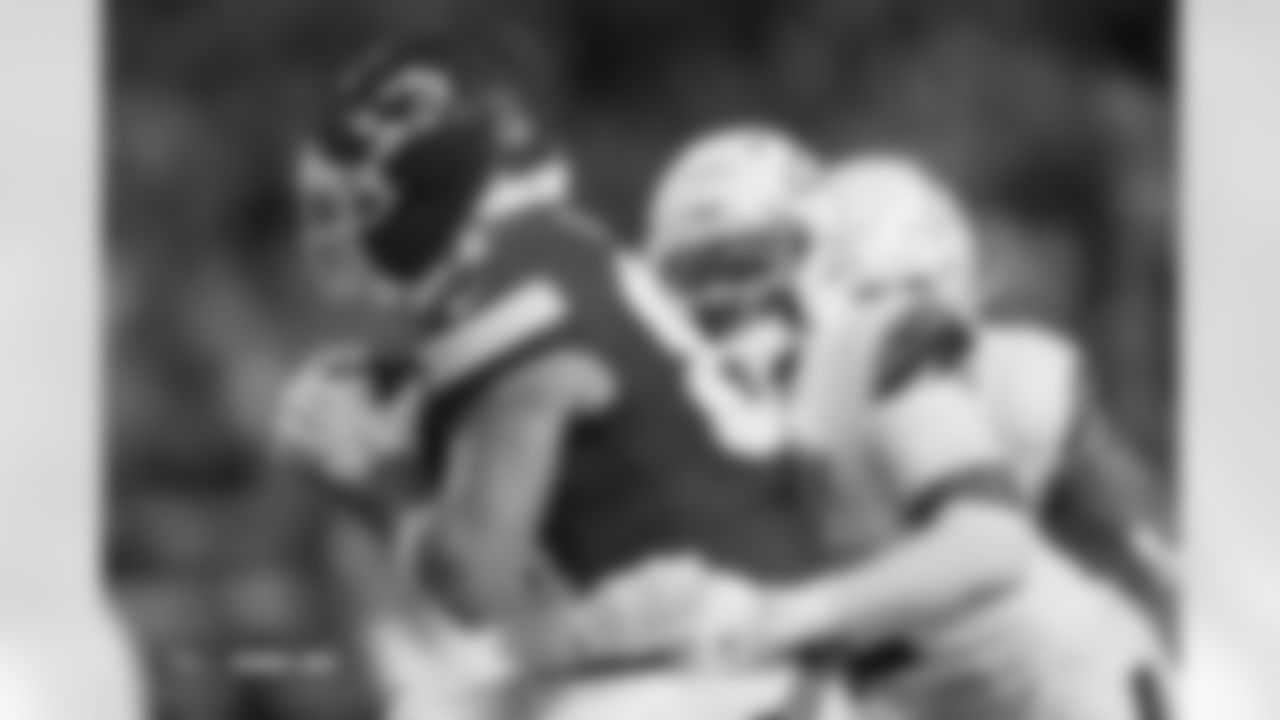 Pat Surtain II tackles Travis Kelce during the Broncos' Week 17 game against the Kansas City Chiefs at GEHA Field at Arrowhead Stadium in Kansas City, Missouri on December 25, 2025. Photo by Ben Swanson / Denver Broncos