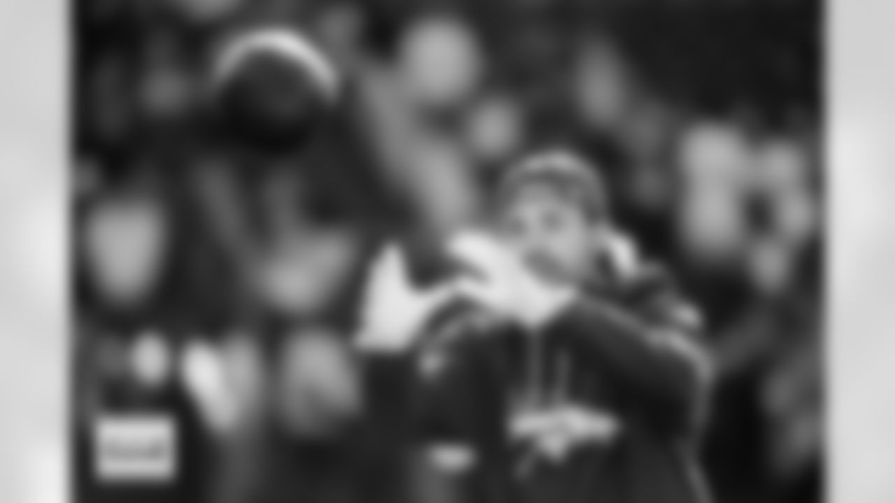 Riley Moss warms up before the Broncos' Week 15 game against the Green Bay Packers at Empower Field at Mile High in Denver, Colorado on December 14, 2025. Photo by Ben Swanson / Denver Broncos