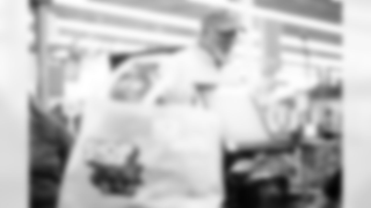 Children from the Boys & Girls Club participate in a Shop with a Jock shopping spree with Broncos players, alumni and cheerleader alumni in Aurora, Colorado on December 15, 2025. Photo by Ben Swanson / Denver Broncos