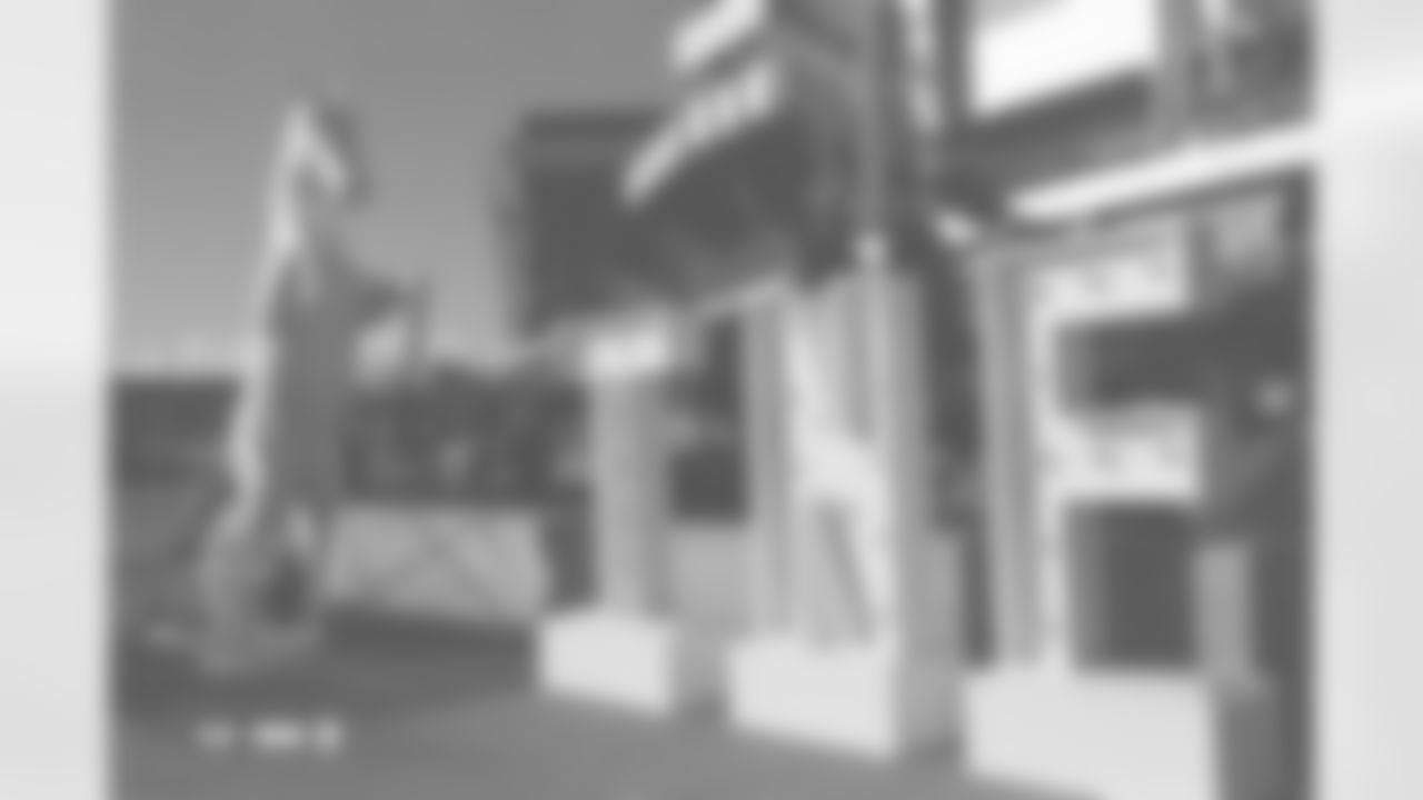 Mini Bucky and TNF in front of the stadium photographed on film during the Broncos' Week 10 game against the Las Vegas Raiders at Empower Field at Mile High in Denver, Colorado on November 7, 2025. Photo by Gabriel Christus / Denver Broncos