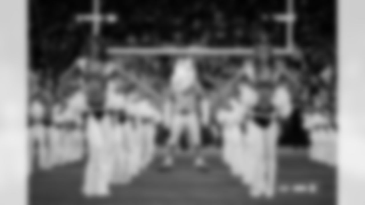 Miles the Mascot and the Denver Broncos Cheerleaders photographed on film during the Broncos' Week 10 game against the Las Vegas Raiders at Empower Field at Mile High in Denver, Colorado on November 7, 2025. Photo by Gabriel Christus / Denver Broncos