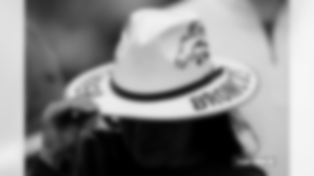 A fan holds her hat during the Broncos' Week 18 game against the Los Angeles Chargers at Empower Field at Mile High in Denver, Colorado on January 4, 2026. Photo by Ben Swanson / Denver Broncos