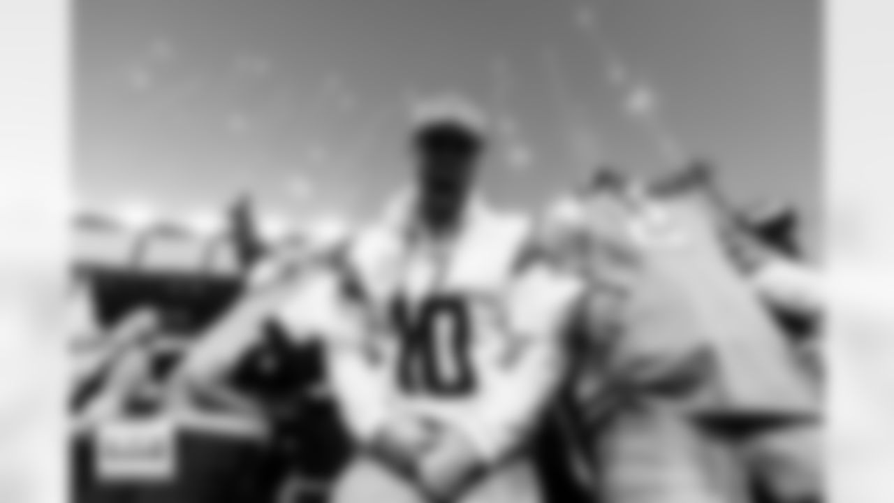 Fans yell as fireworks go off during the Broncos' Divisional Round playoff game against the Buffalo Bills at Empower Field at Mile High in Denver, Colorado on January 17, 2026. Photo by Ben Swanson / Denver Broncos