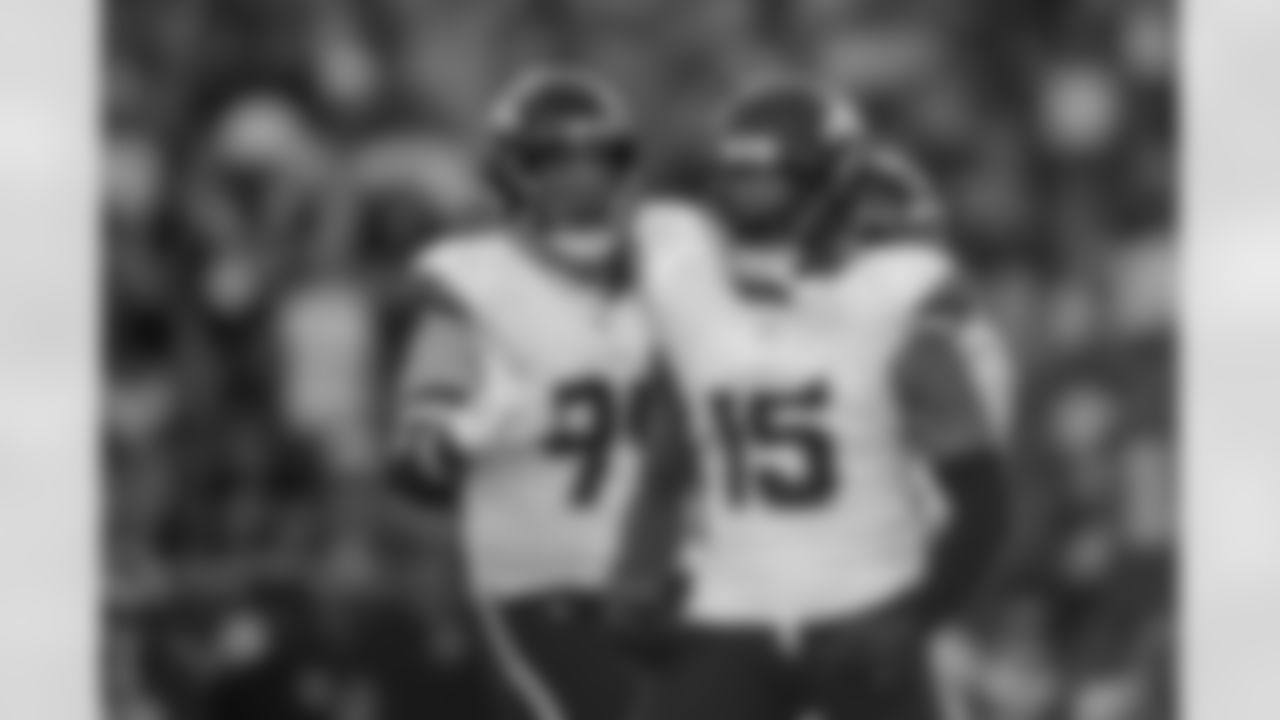 Denver Broncos linebacker Nik Bonitto (15) celebrates with defensive end Zach Allen (99) after a sack during the Broncos' Week 5 game against the Philadelphia Eagles at Lincoln Financial Field in Philadelphia, Pennsylvania on October 5, 2025. Photo by Gabriel Christus / Denver Broncos