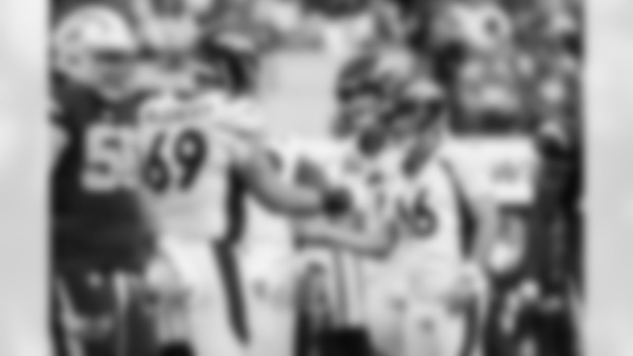 Mike McGlinchey and Wil Lutz during the Broncos' Week 14 game against the Los Angeles Chargers at SoFi Stadium in Inglewood, California on December 10, 2023. Photo by Ben Swanson / Denver Broncos