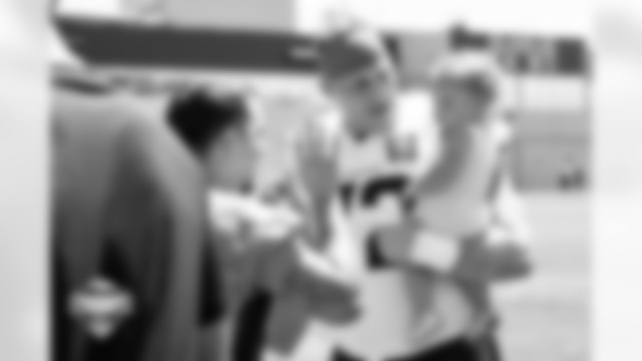 Garett Bolles during the Savannah Bananas' and The Firefighters baseball team's visit to training camp practice at Broncos Park Powered by CommonSpirit on August 12, 2025 in Englewood, Colorado. Photo by Ben Swanson / Denver Broncos