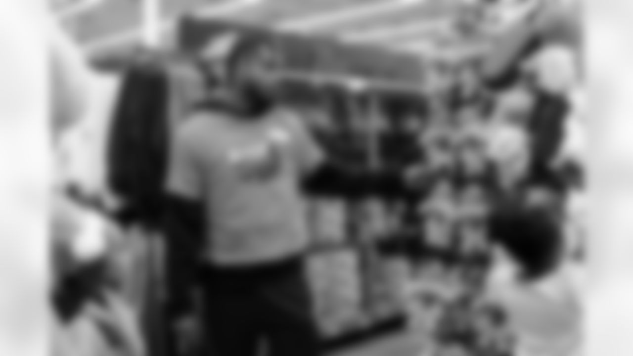 Children from the Denver Broncos Boys & Girls Club participate in a Shop with a Jock shopping spree with Broncos players, alumni and cheerleader alumni in Aurora, Colorado on December 2, 2025. Photo by Ben Swanson / Denver Broncos