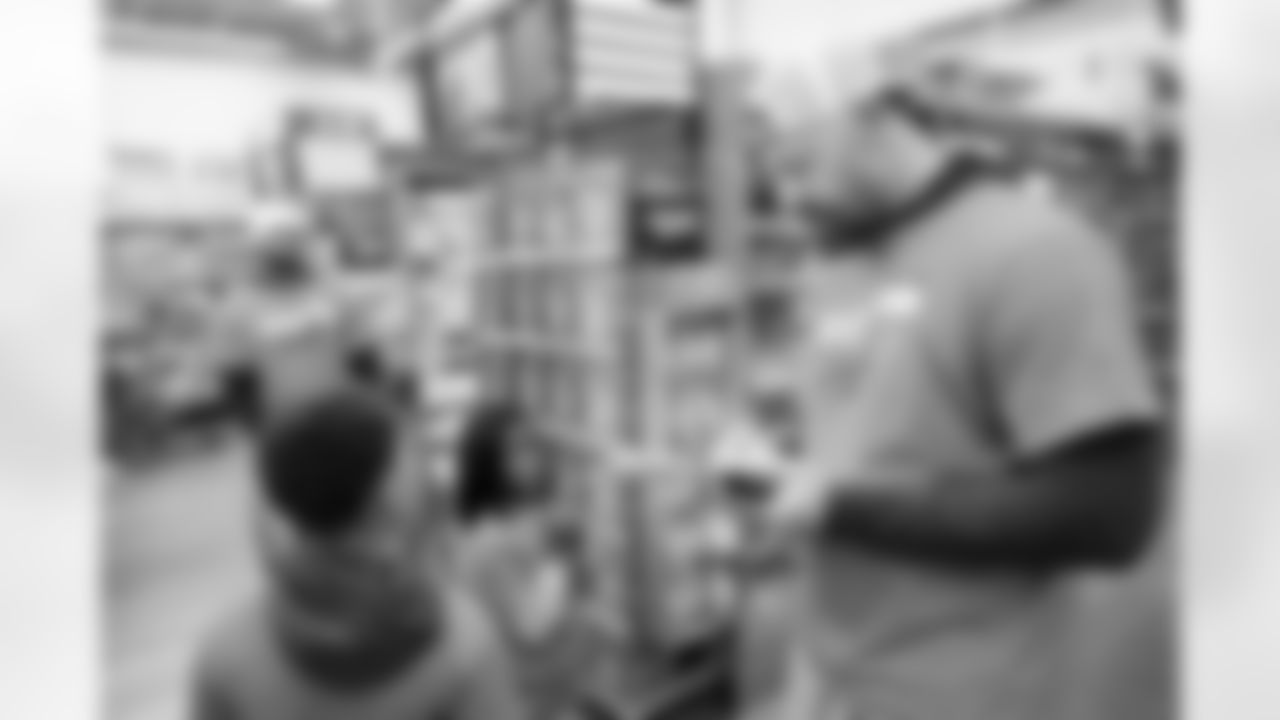 Children from the Denver Broncos Boys & Girls Club participate in a Shop with a Jock shopping spree with Broncos players, alumni and cheerleader alumni in Aurora, Colorado on December 2, 2025. Photo by Ben Swanson / Denver Broncos