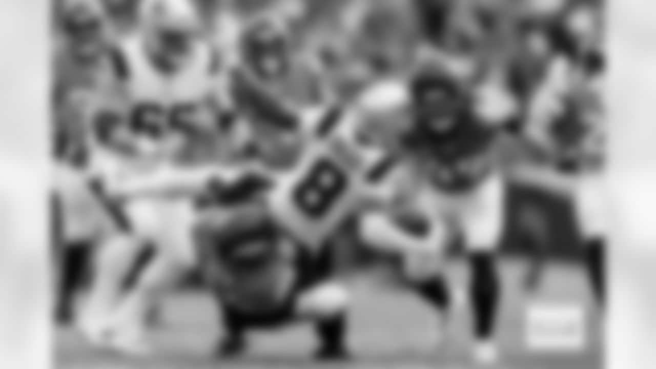 Denver Broncos safety Devon Key (26) tackles New England Patriots wide receiver Stefon Diggs (8) during the AFC Championship Game between the Denver Broncos and New England Patriots at Empower Field at Mile High in Denver, Colorado on January 25, 2026. Photo by Gabriel Christus / Denver Broncos