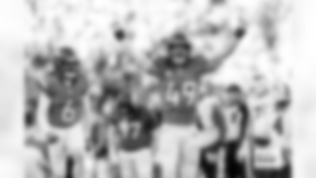 Denver Broncos linebacker Alex Singleton (49) reacts with safety P.J. Locke (6) after forcing a fumble during the Broncos' Divisional Round playoff game against the Buffalo Bills at Empower Field at Mile High in Denver, Colorado on January 17, 2026. Photo by Gabriel Christus / Denver Broncos