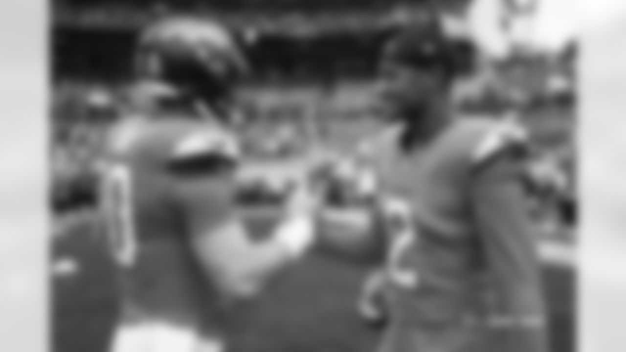 Bo Nix (10) and Pat Surtain II (2) before the Broncos' Week 8 game against the Carolina Panthers at Empower Field at Mile High in Denver, Colorado on October 27, 2024. Photo by Ben Swanson / Denver Broncos