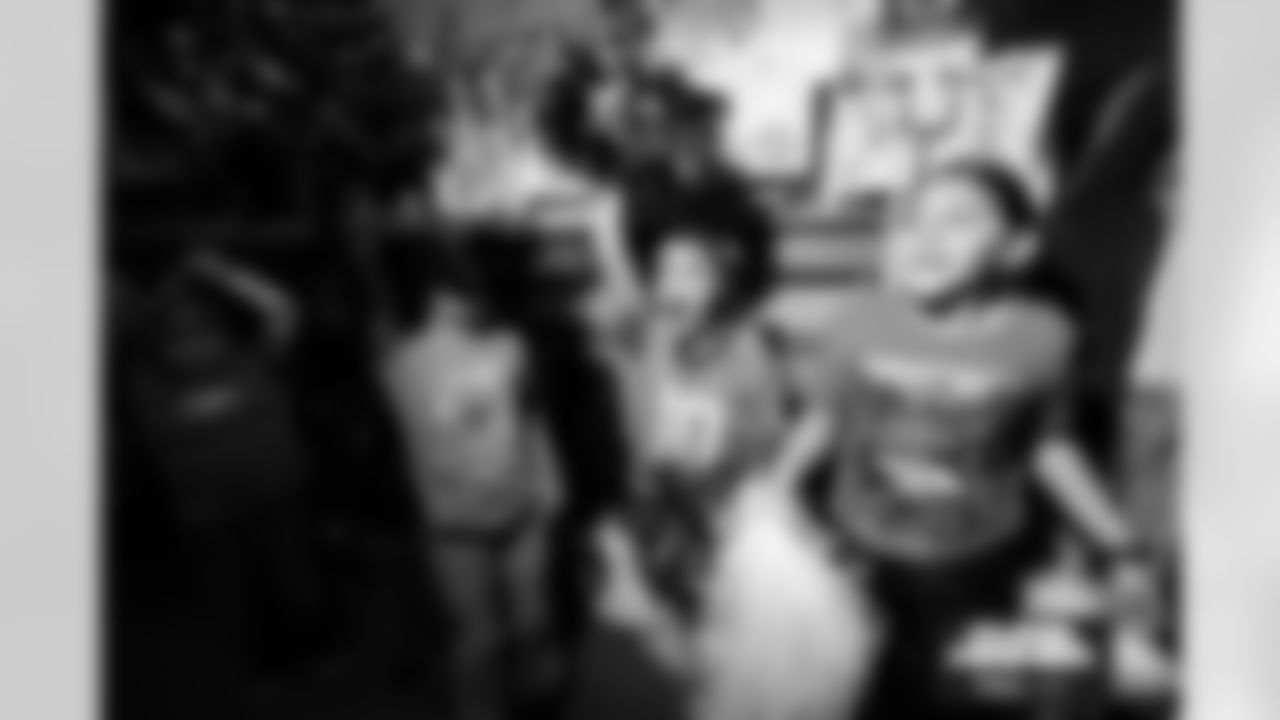 Students cheer on the Broncos during a school hallway parade to celebrate the Denver Broncos making the playoffs at Doull Elementary School in Denver, Colorado on January 16, 2026. Photo by Ben Swanson / Denver Broncos