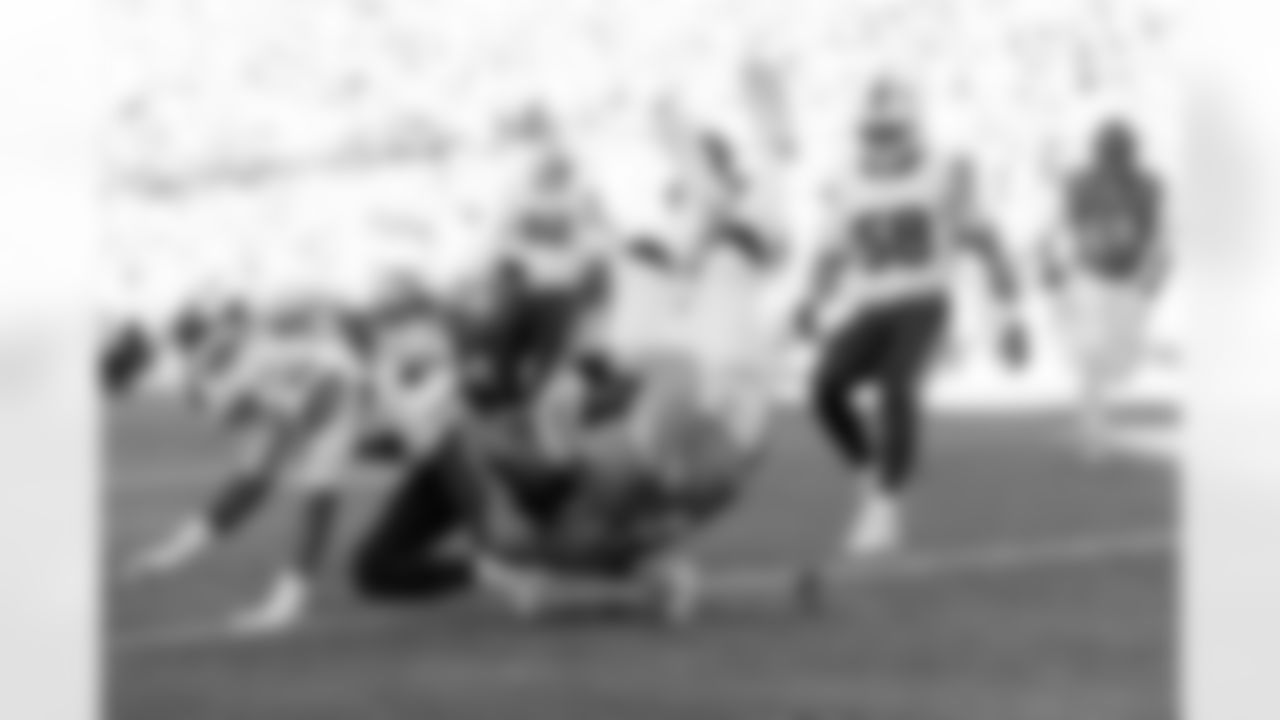 Denver Broncos offensive tackle Frank Crum (73) runs with the ball after a reception into the end zone for a touchdown during the Broncos' Divisional Round playoff game against the Buffalo Bills at Empower Field at Mile High in Denver, Colorado on January 17, 2026. Photo by Gabriel Christus / Denver Broncos