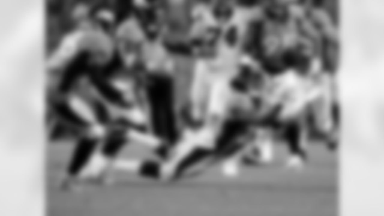 Denver Broncos cornerback Chris Harris (25) intercepts a pass against the Carolina Panthers during the second half of a game on Thursday, Sept. 8, 2016, in Denver. (AP Photo/Joe Mahoney)