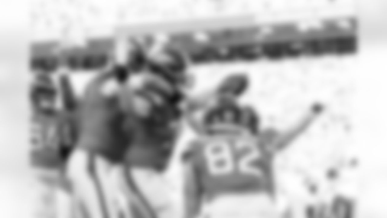 Denver Broncos offensive tackle Frank Crum (73) celebrates with offensive tackle Mike McGlinchey (69) and teammates after scoring a touchdown during the Broncos' Divisional Round playoff game against the Buffalo Bills at Empower Field at Mile High in Denver, Colorado on January 17, 2026. Photo by Gabriel Christus / Denver Broncos