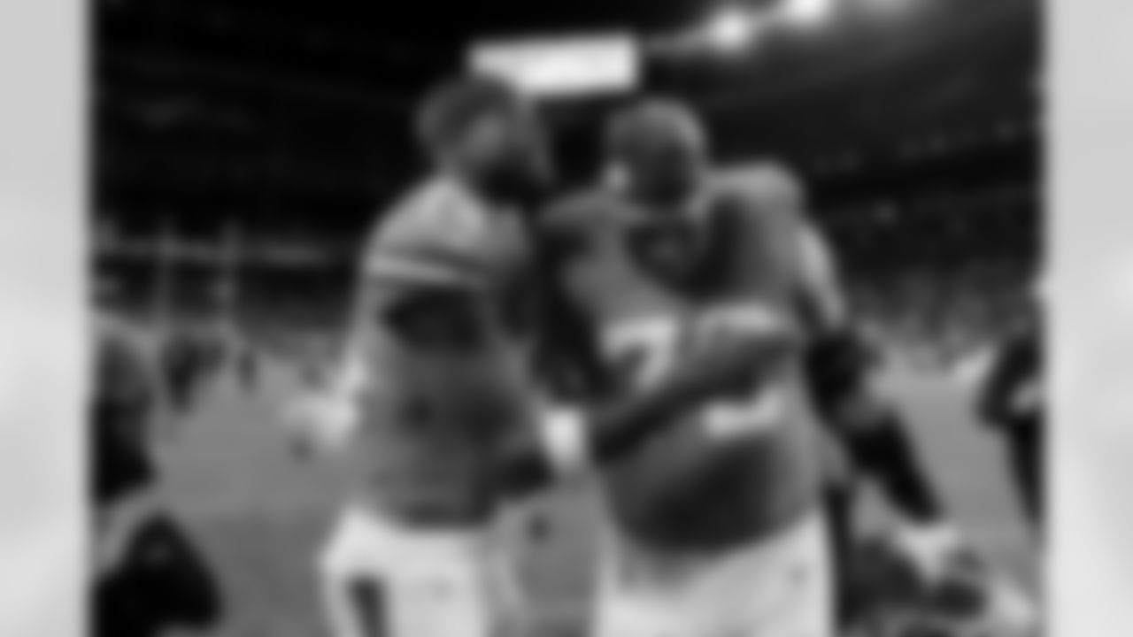 Denver Broncos wide receiver Courtland Sutton (14) hugs offensive tackle Garett Bolles (72) after the Broncos' Week 18 game against the Los Angeles Chargers at Empower Field at Mile High in Denver, Colorado on January 4, 2026. Photo by Ben Swanson / Denver Broncos