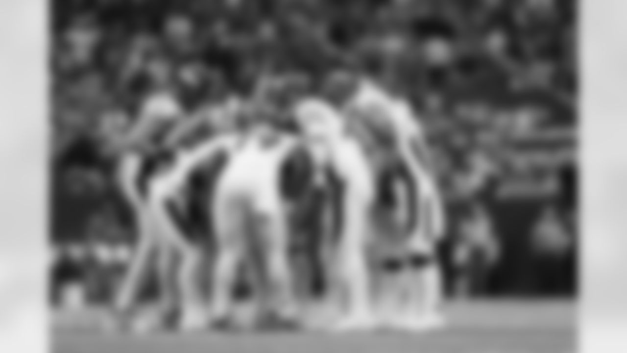 The offense huddles during the Broncos' Week 13 game against the Houston Texans at NRG Stadium in Houston, Texas on December 3, 2023. Photo by Gabriel Christus / Denver Broncos