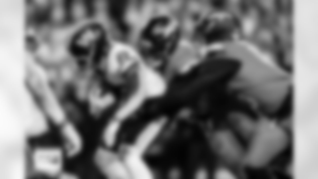 Denver Broncos linebacker Jonathon Cooper (0) tackles Washington Commanders running back Jacory Croskey-Merritt (22) during the Broncos' Week 13 game against the Washington Commanders at Northwest Stadium in Landover, Maryland on November 30, 2025. Photo by Ben Swanson / Denver Broncos