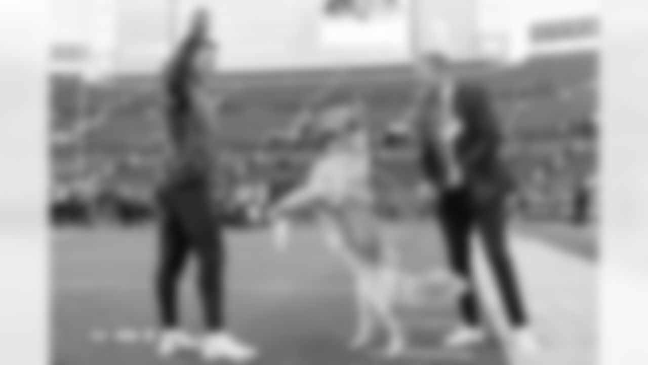 Bo Nix, Kirk Herbstreit and his dog, Peter, photographed on film during the Broncos' Week 10 game against the Las Vegas Raiders at Empower Field at Mile High in Denver, Colorado on November 8, 2025. Photo by Gabriel Christus / Denver Broncos