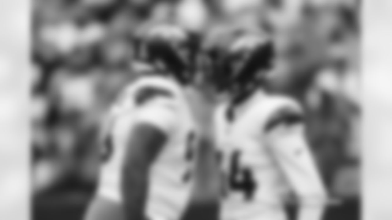 Eyioma Uwazurike and JL Skinner during the Broncos' Week 9 game against the Houston Texans at NRG Stadium in Houston, Texas on November 2, 2025. Photo by Ben Swanson / Denver Broncos