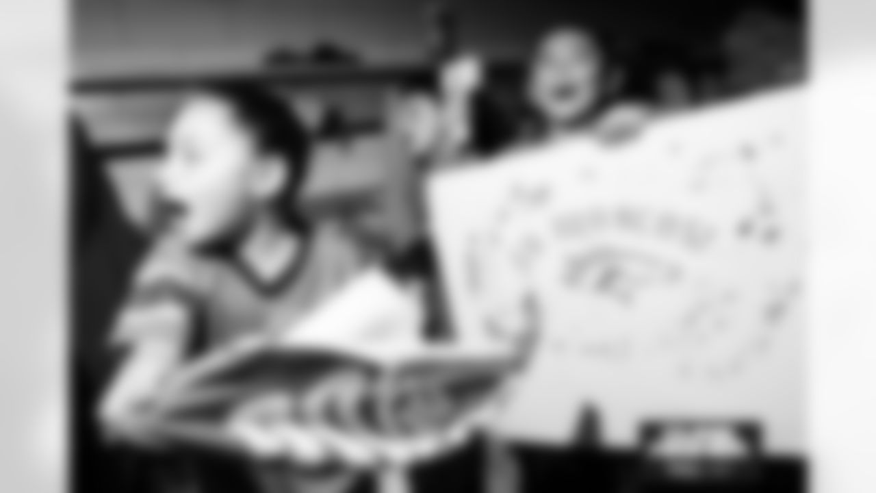 Students cheer on the Broncos during a school hallway parade to celebrate the Denver Broncos making the playoffs at Doull Elementary School in Denver, Colorado on January 16, 2026. Photo by Ben Swanson / Denver Broncos