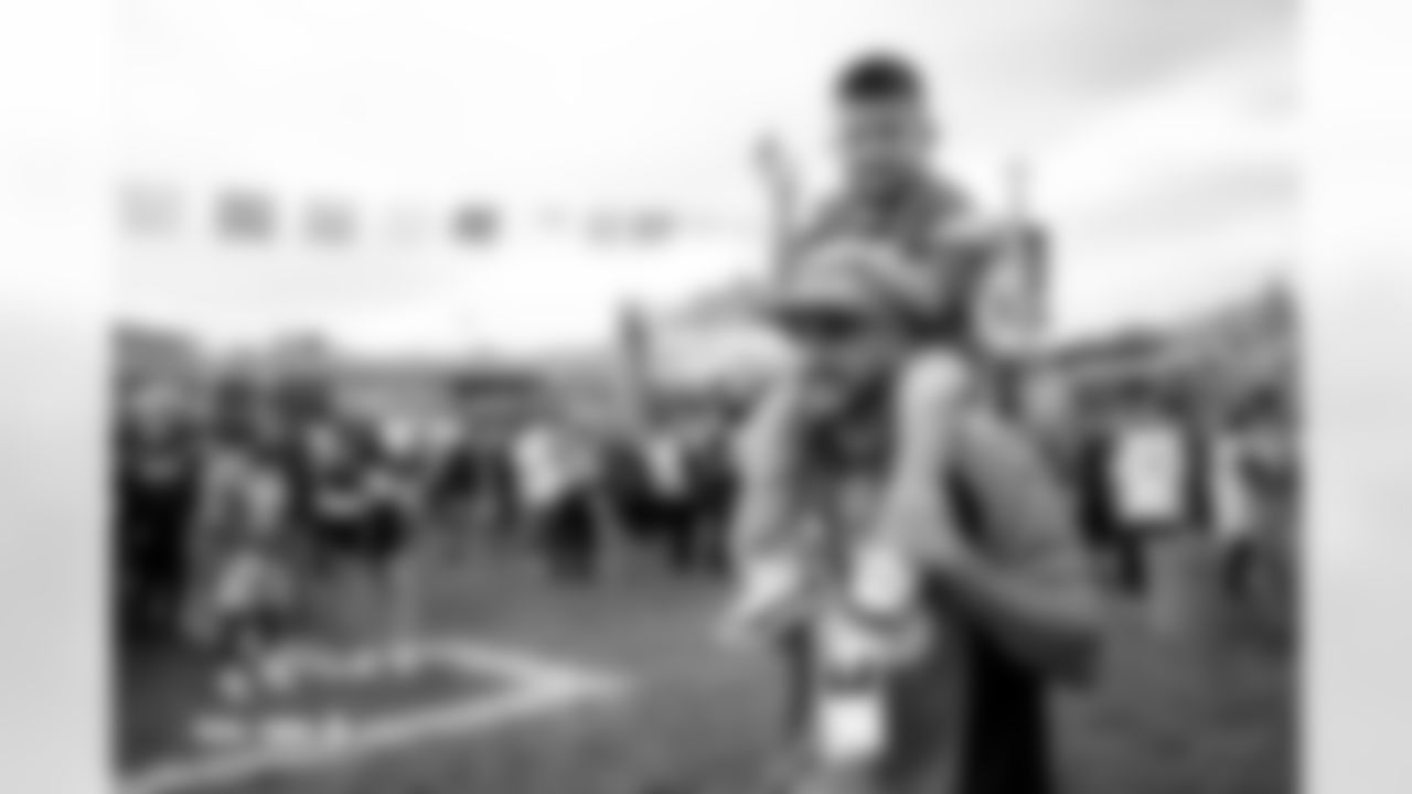 Fans mingle on Mane Street before the Broncos' Week 8 game against the Dallas Cowboys at Empower Field at Mile High in Denver, Colorado on October 26, 2025. Photo by Ben Swanson / Denver Broncos