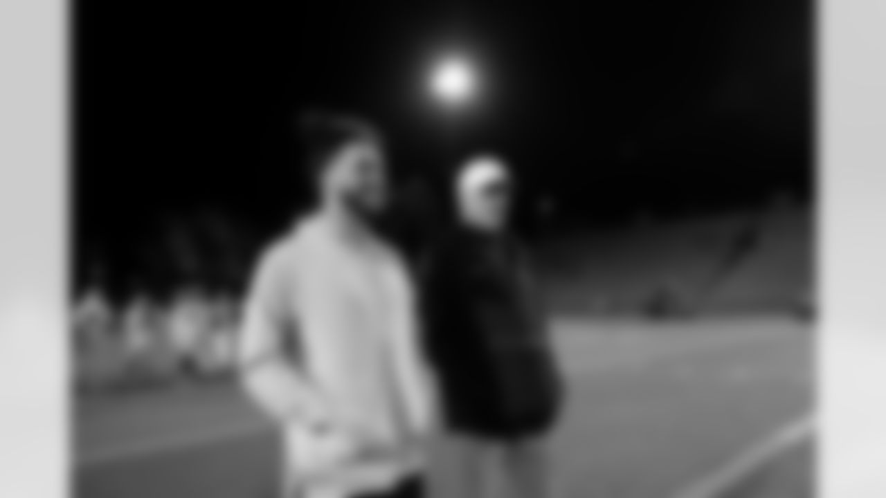 Talanoa Hufanga talks with Dave Logan during a visit to watch Cherry Creek play Fountain Fort Carson on Friday, November 14, 2025 at Cherry Creek High School in Greenwood Village, Colorado.
Photo by Gabriel Christus / Denver Broncos