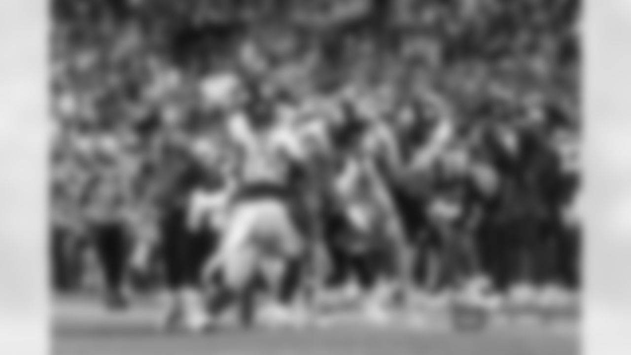 Broncos players make a tackle during the Broncos' preseason Week 2 game against the Green Bay Packers. Photo by Nicole Pennetta / Denver Broncos