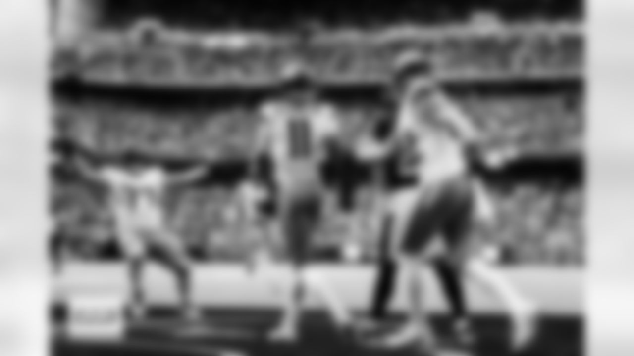 Denver Broncos wide receiver Troy Franklin (11) celebrates a two-point conversion with guard Quinn Meinerz (77) and tight end Adam Trautman (82) during the Broncos' Week 9 game against the Houston Texans at NRG Stadium in Houston, Texas on November 2, 2025. Photo by Gabriel Christus / Denver Broncos