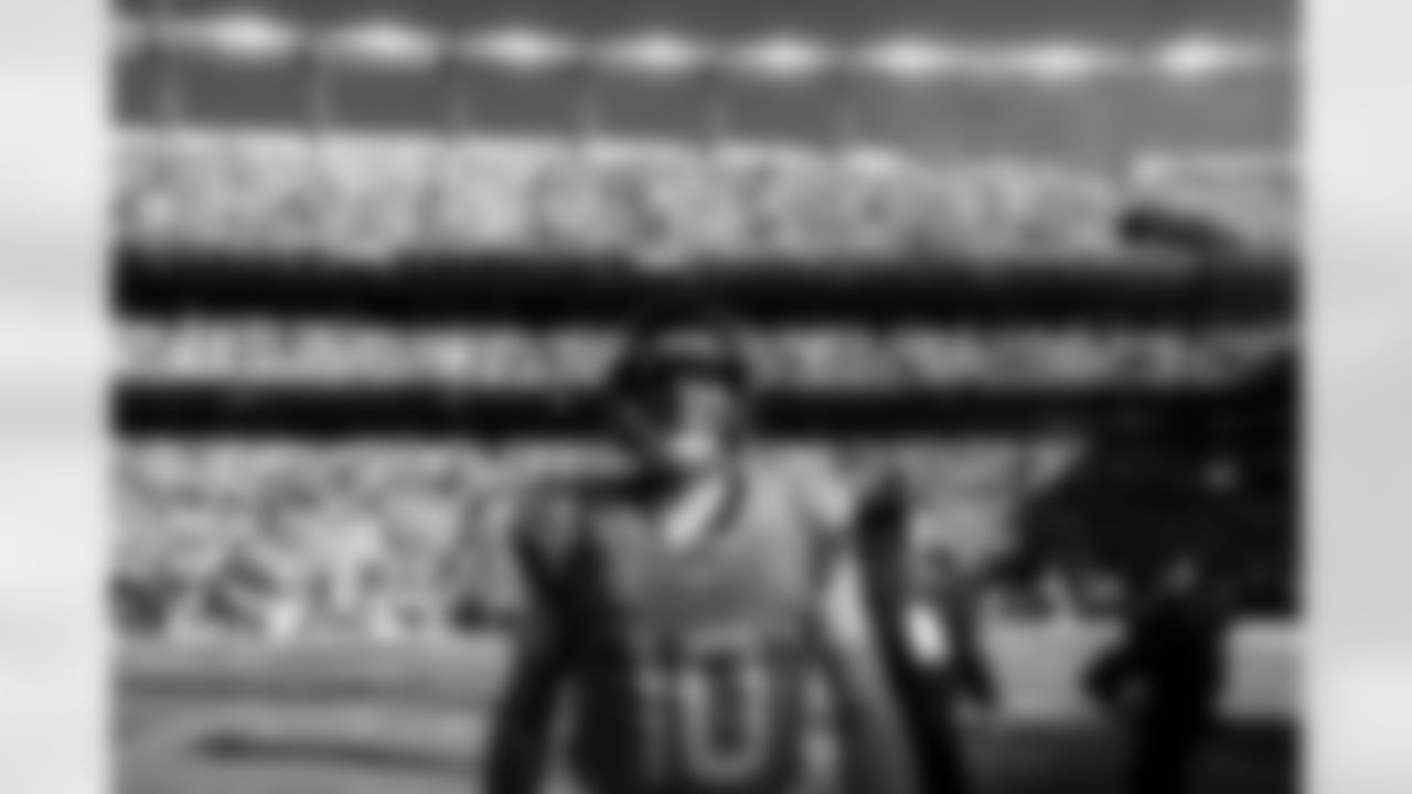 Denver Broncos quarterback Bo Nix (10) walks back from the coin toss before the Broncos' Divisional Round playoff game against the Buffalo Bills at Empower Field at Mile High in Denver, Colorado on January 17, 2026. Photo by Gabriel Christus / Denver Broncos